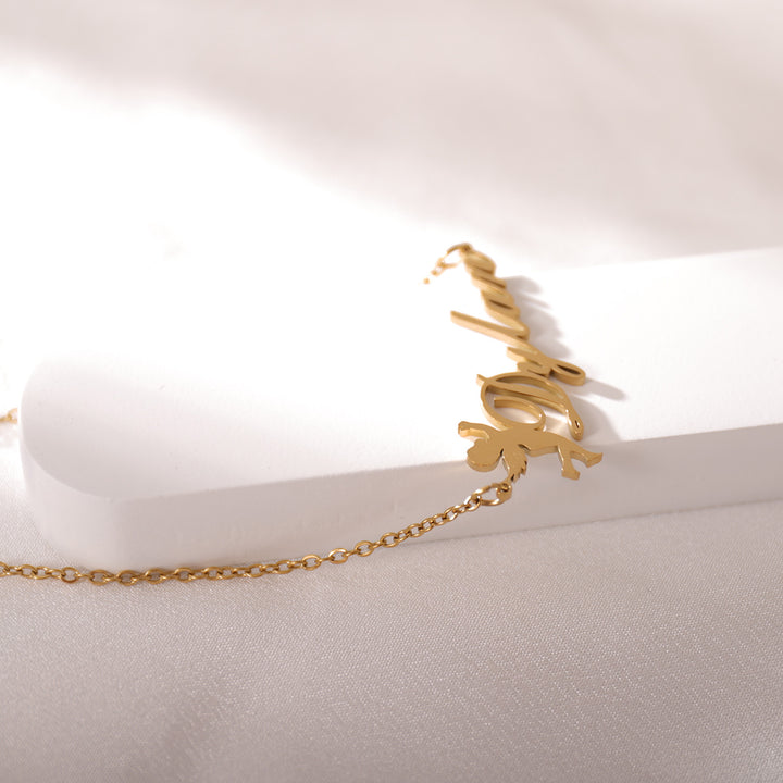 Close-up of angel boy pendant – handcrafted necklace by LUNA