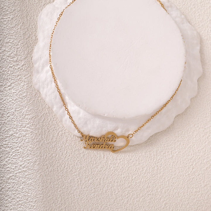 Close-up of engraved double name necklace – handcrafted by LUNA
