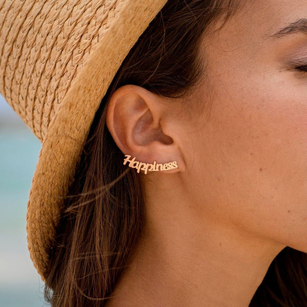 Gold arc-shaped name earrings with elegant cursive letters