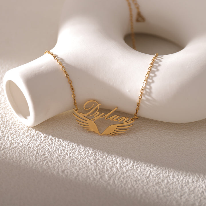 Gold winged name pendant necklace – symbol of protection and love