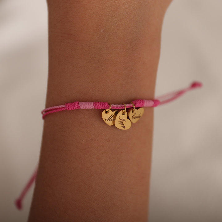 Heart-shaped knot bracelet with personalized name charm – meaningful and delicate