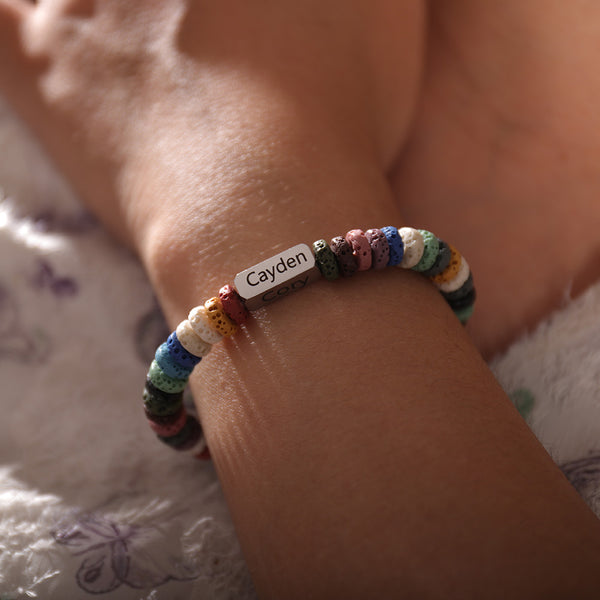 Lava stone bracelet with multiple custom name beads – personalized men’s jewelry