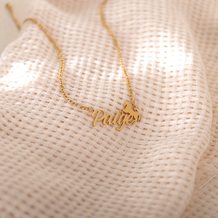 Model wearing galloping horse necklace – stylish and meaningful design