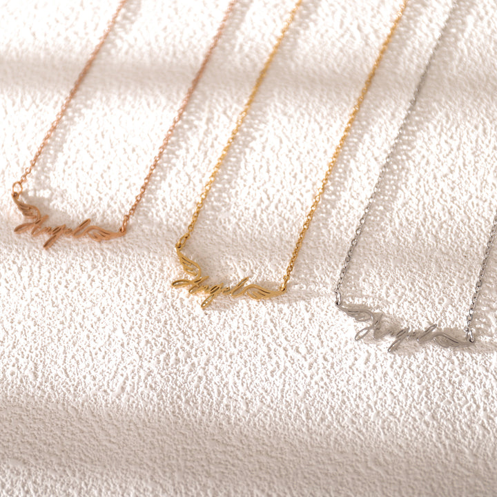 Rose gold cursive name necklace close-up – meaningful gift for her