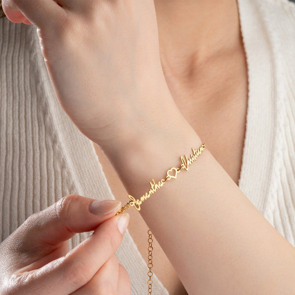 Two name bracelet with heart charm in gold – personalized for couples