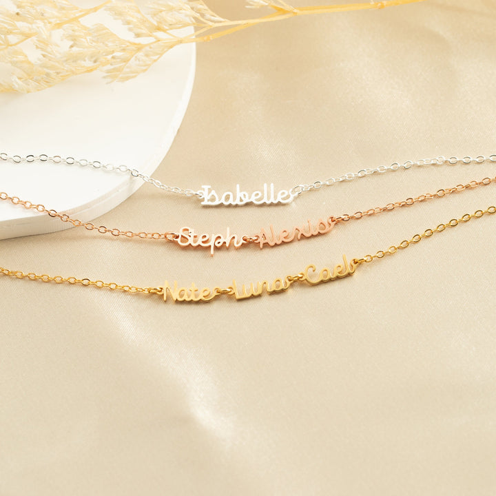 Wrist shot of multi-name engraved bracelet – elegant and sentimental